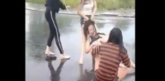 1 thiếu nữ bị đánh hội đồng dưới trời mưa