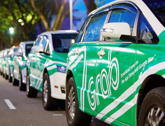 Hà Nội, Sài Gòn cùng kiến nghị dừng Uber, Grab