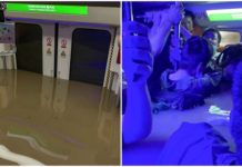 Nước lũ ồ ạt dâng đến cổ hành khách trên tàu điện ngầm Trung Quốc