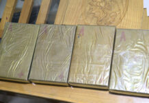 Người phụ nữ bị bắt quả tang mang bán 1,3 kg heroin giữa thành phố